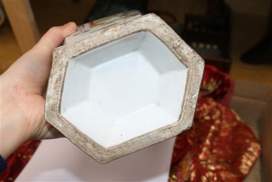 A Chinese porcelain vase decorated in enamels with figures in a garden 33cm